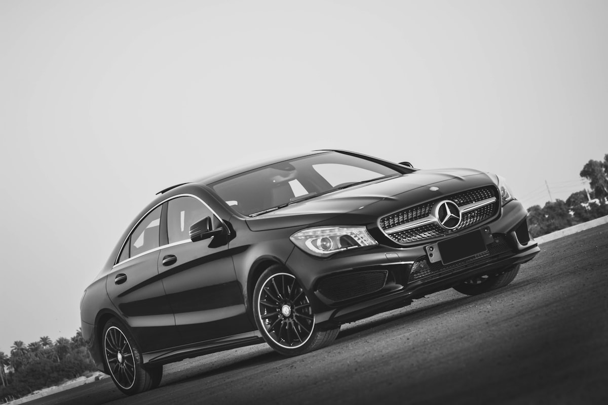 grayscale photo of mercedes benz coupe